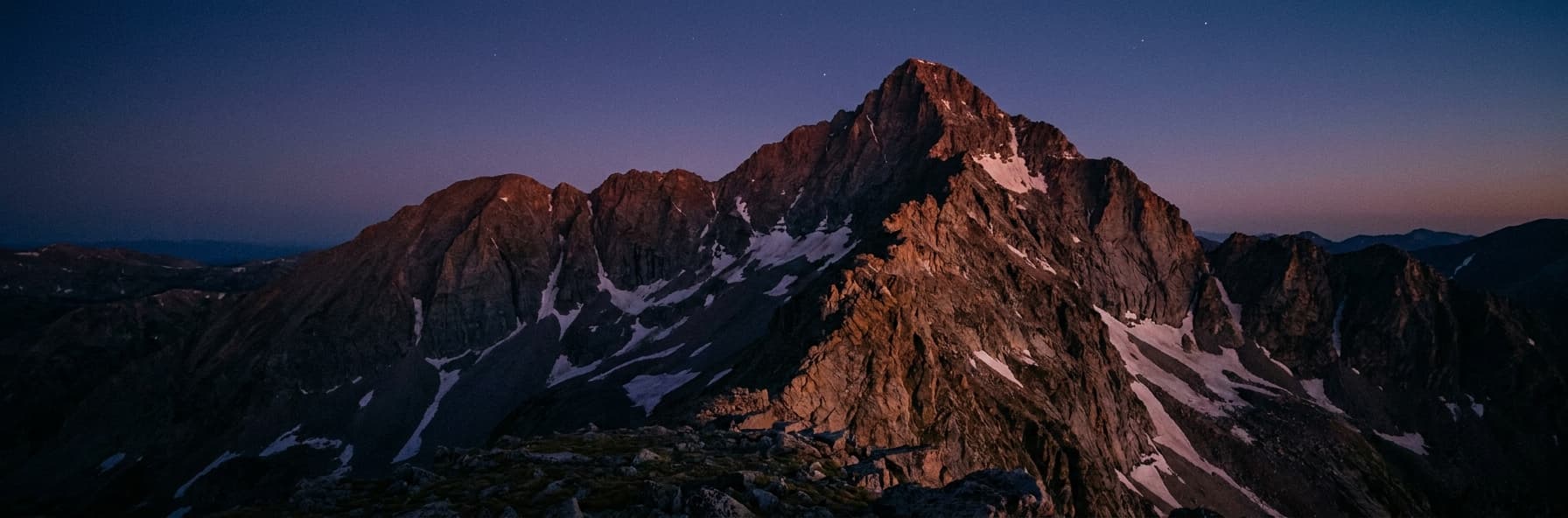 Capitol Peak at twilight with the last alpenglow on the summit ridge